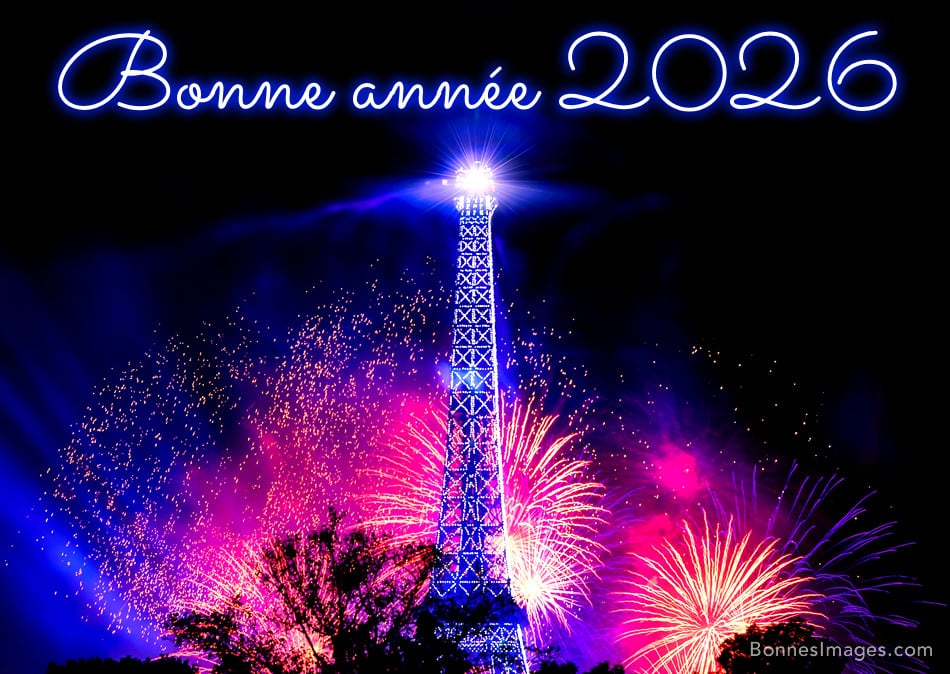 Tour Eiffel illuminée par des feux d'artifice colorés avec « Bonne année » en néon