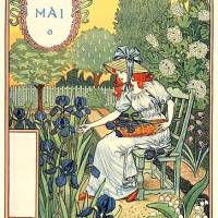 Une femme assise dans un jardin cueille des fleurs au mois de mai.